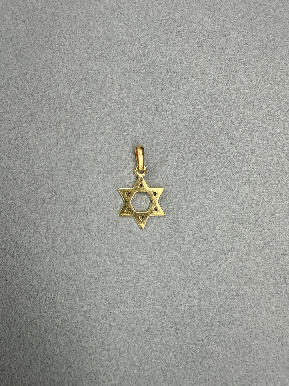 Dije estrella de David Italiano especial 18k