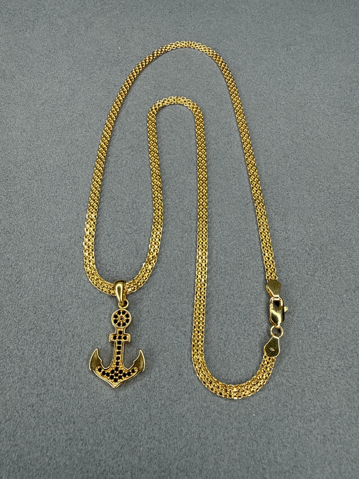 Dije Ancla de circon negro Nacional 18k